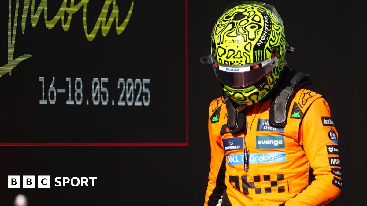 Lando Norris heading back to the McLaren garage after qualifying.