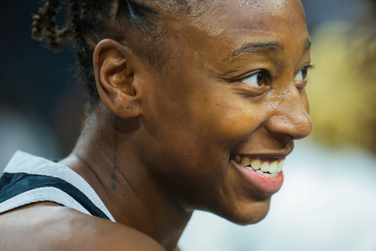 Aces guard Jewell Loyd smiles following a WNBA basketball game between the Aces and Washington ...