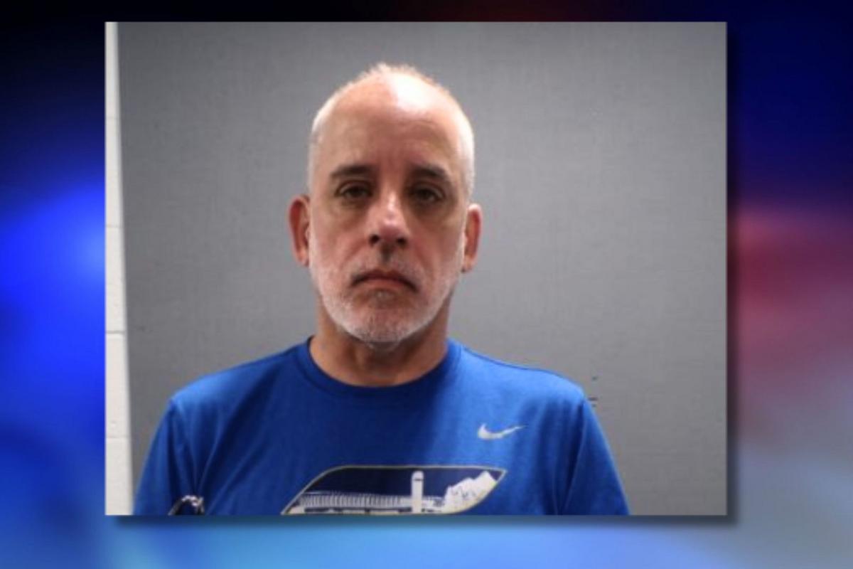 NJ coach charged with dragging teen by ankle