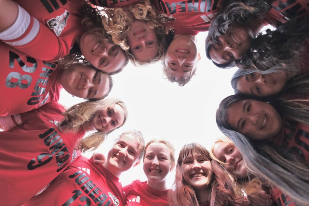 Seniors from the Juneau-Douglas High School: Yadaa.at Kalé Crimson Bears girls soccer team pose for a photo this week. (Klas Stolpe / Juneau Empire)