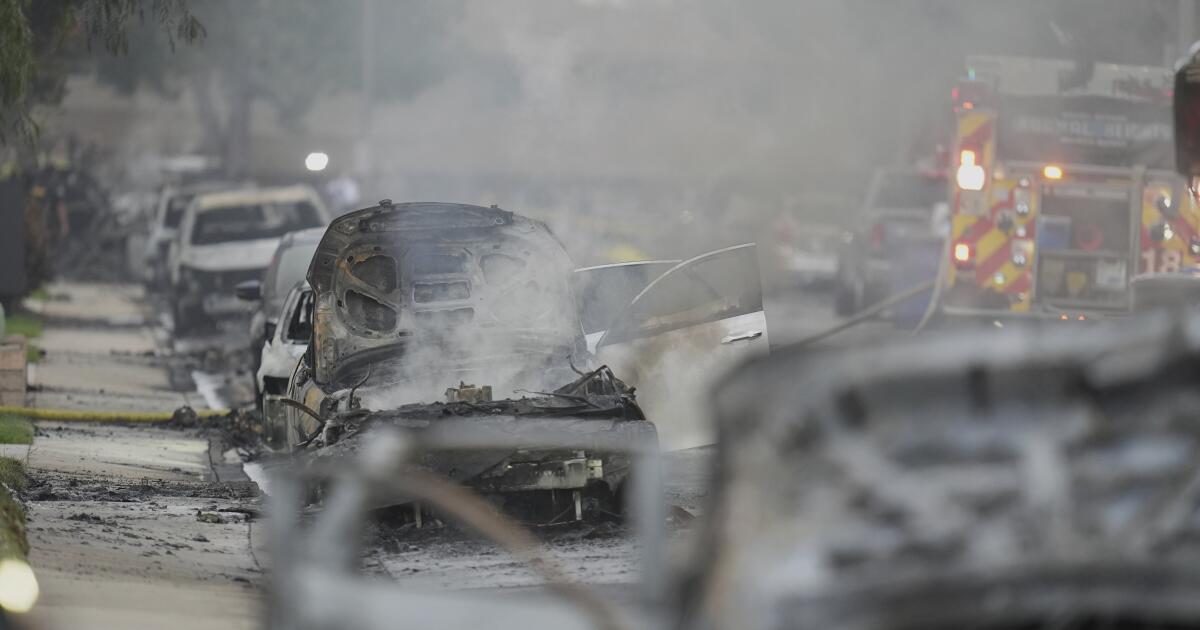 San Diego plane crash sparks fires, creates 'giant debris field'