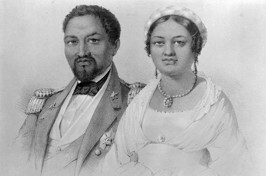 The Queen honored via the busy Queen St