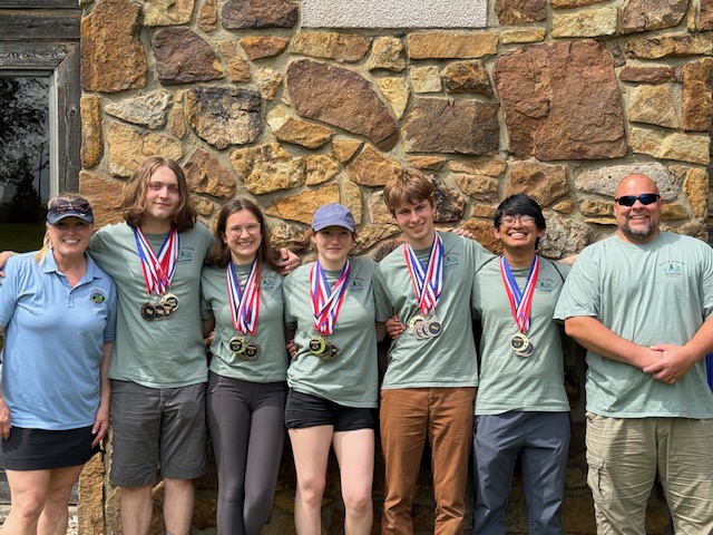 Photo of the Gatton team alongside Penny Warwick and Bobby Warwick