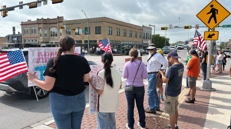 'We're interested in keeping this a democracy': Hundreds gather for No Kings protest in Taylor