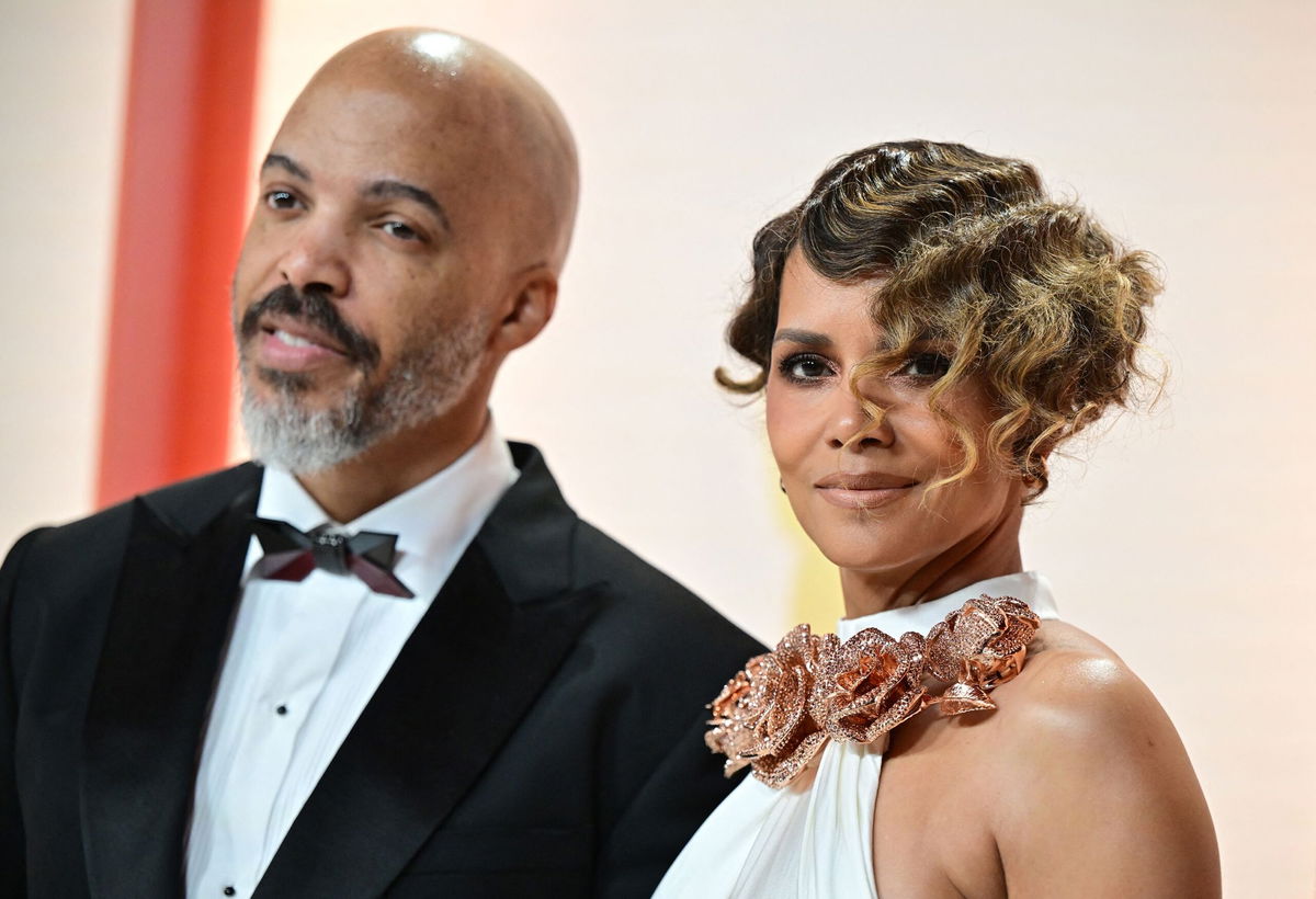 Frederic J. Brown/AFP via Getty Images via CNN NewsourceHalle Berry and singer Van Hunt in 2023.