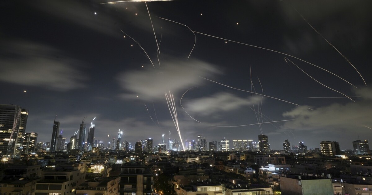 Israeli strikes hit Tehran, Iran says US involvement would risk 'all-out war'
