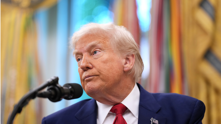 Trump signs travel ban targeting 12 countries