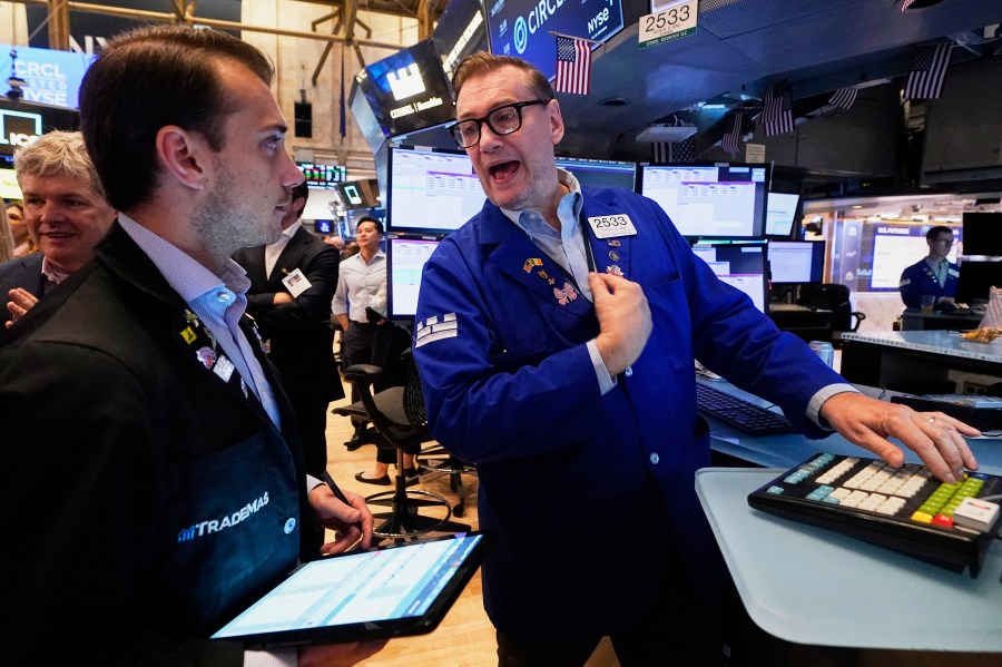 Wall Street gains ground following a solid jobs report and marks another winning week