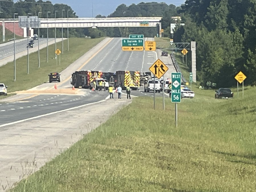 18-wheeler carrying sand flips in crash, closing lanes on U.S. Highway 1/NC-540 in Apex: Officials