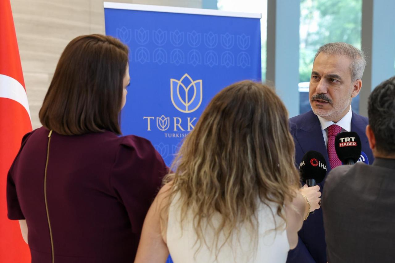 Turkish Foreign Minister Hakan Fidan makes evaluations on the issues about Cyprus and Israeli attacks over Syria to the press members within the Extended Informal Meeting on Cyprus in New York, United States on July 16, 2025. (Turkish Foreign Ministry / AA Photo)