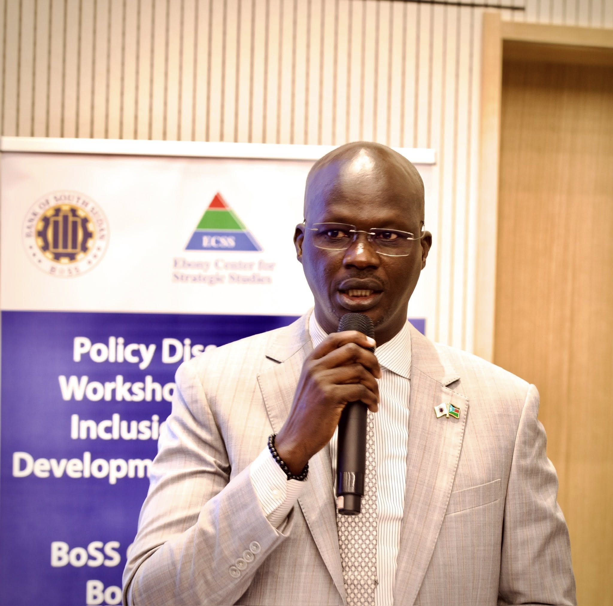 BoSS Governor calls for flexible rules to boost mobile money and microfinance