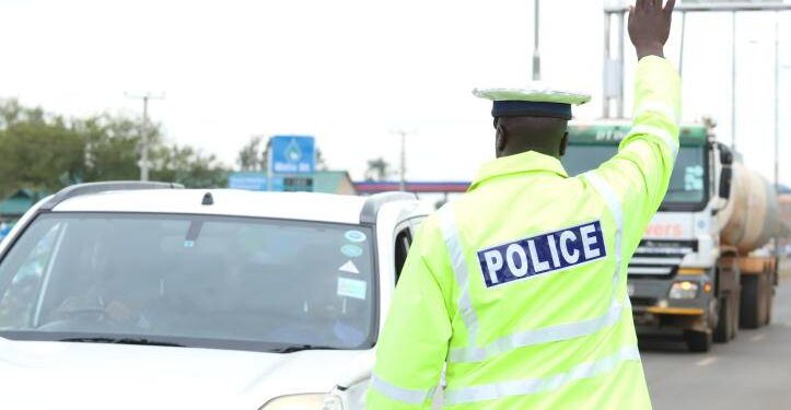 Traffic Police Officer Stops Motorists On Highway.