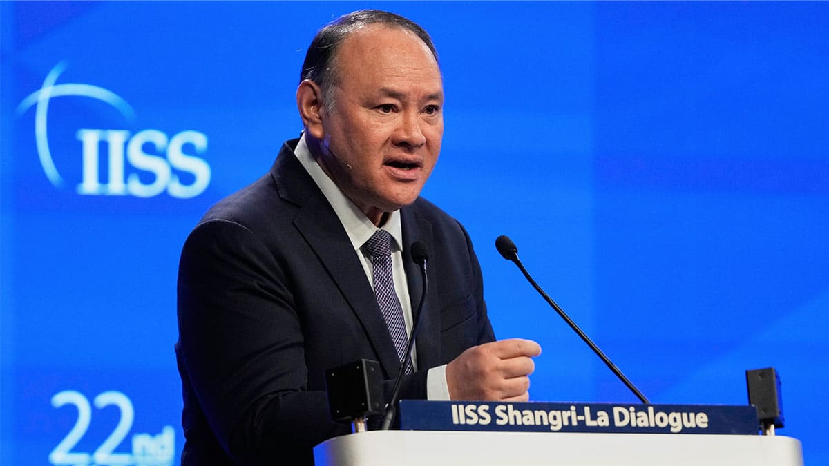 Gilberto Teodoro Jr, Secretary of National Defense of the Philippines, delivers his speech during the 22nd Shangri-La Dialogue summit in Singapore, Sunday, June 1, 2025. (AP Photo/Anupam Nath)