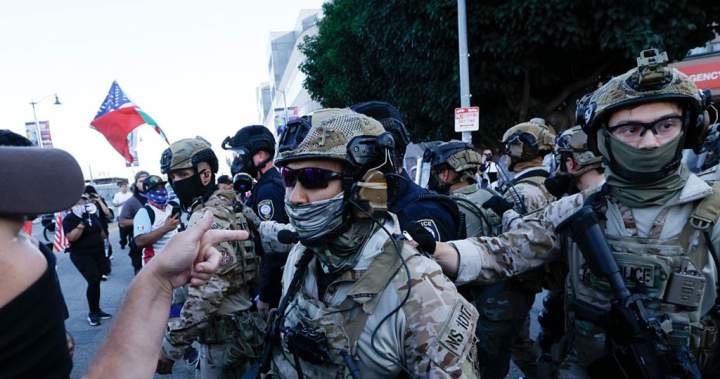 California bans mask use for most law enforcement officers during operations - National