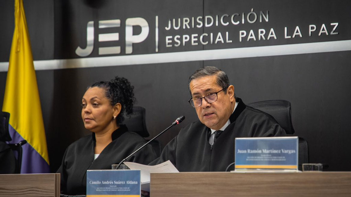 Colombia's war crimes tribunal sentences former FARC chiefs to 8 years of restorative labor