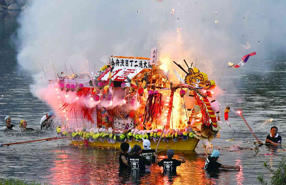 Dragon-Shaped Boats Float Down River in Flames for Edo Period Event in Morioka
