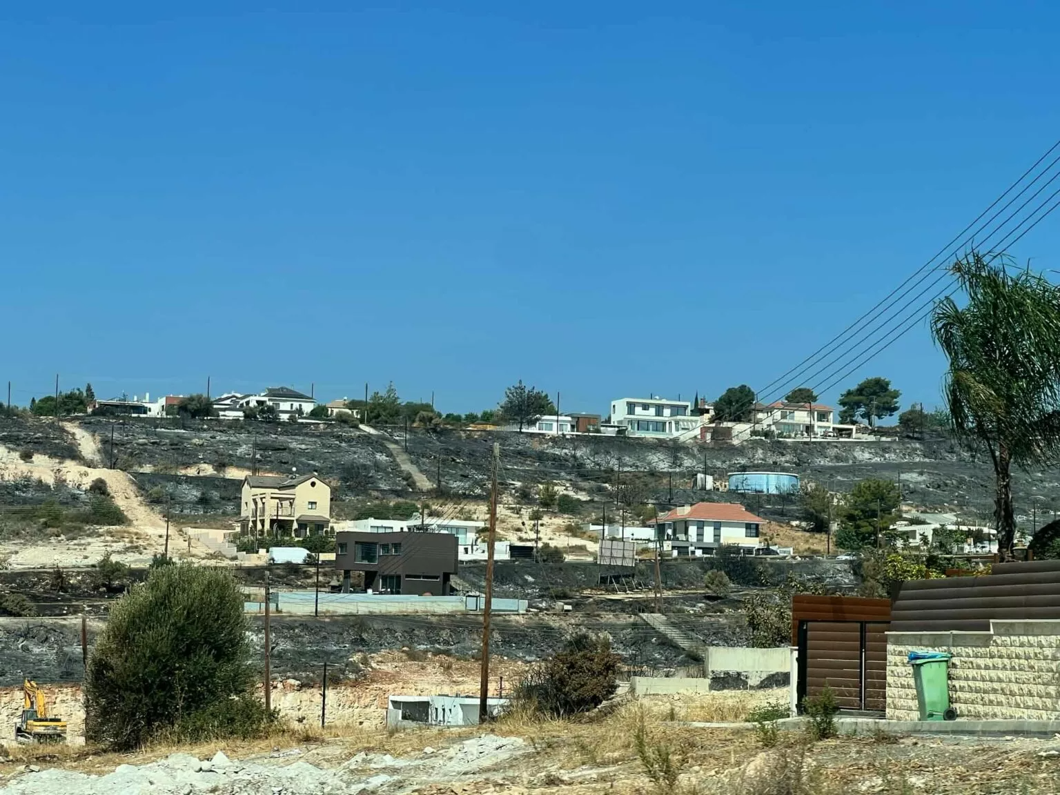 Government fast-tracks building permits for July wildfire victims