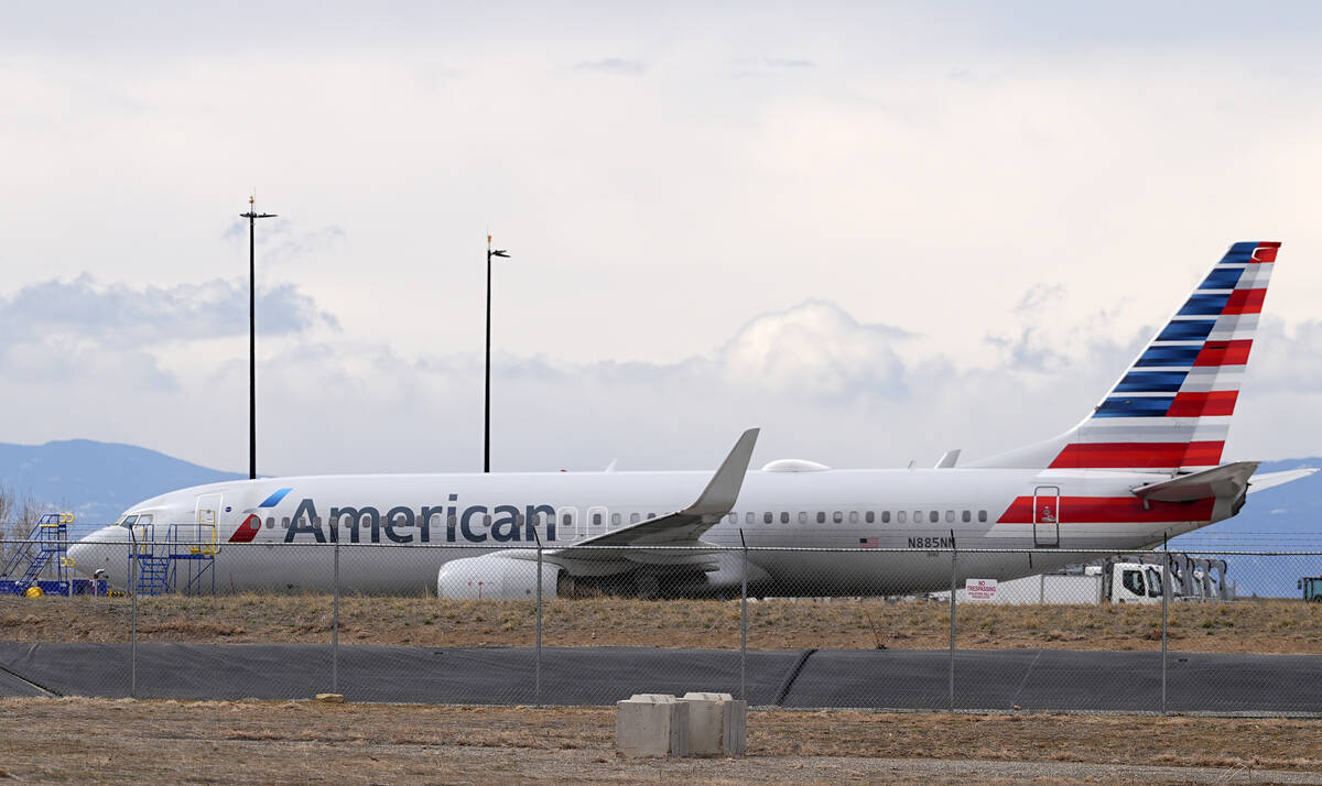 An American Airlines jetliner is seen in Denver on Friday, March 14, 2025. (AP Photo/David Zalu ...