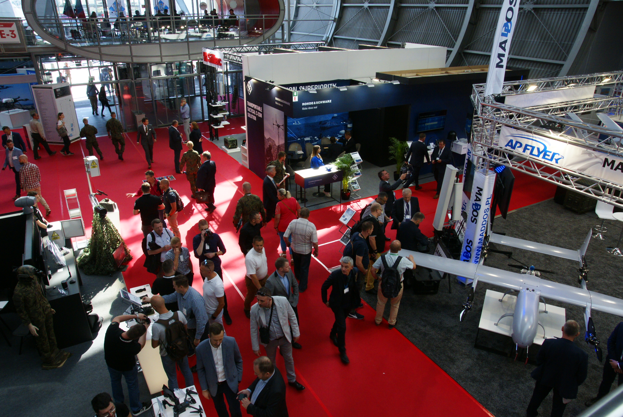 Pro-Palestinian protesters douse Israeli defence firm’s stand with red liquid at Polish arms fair