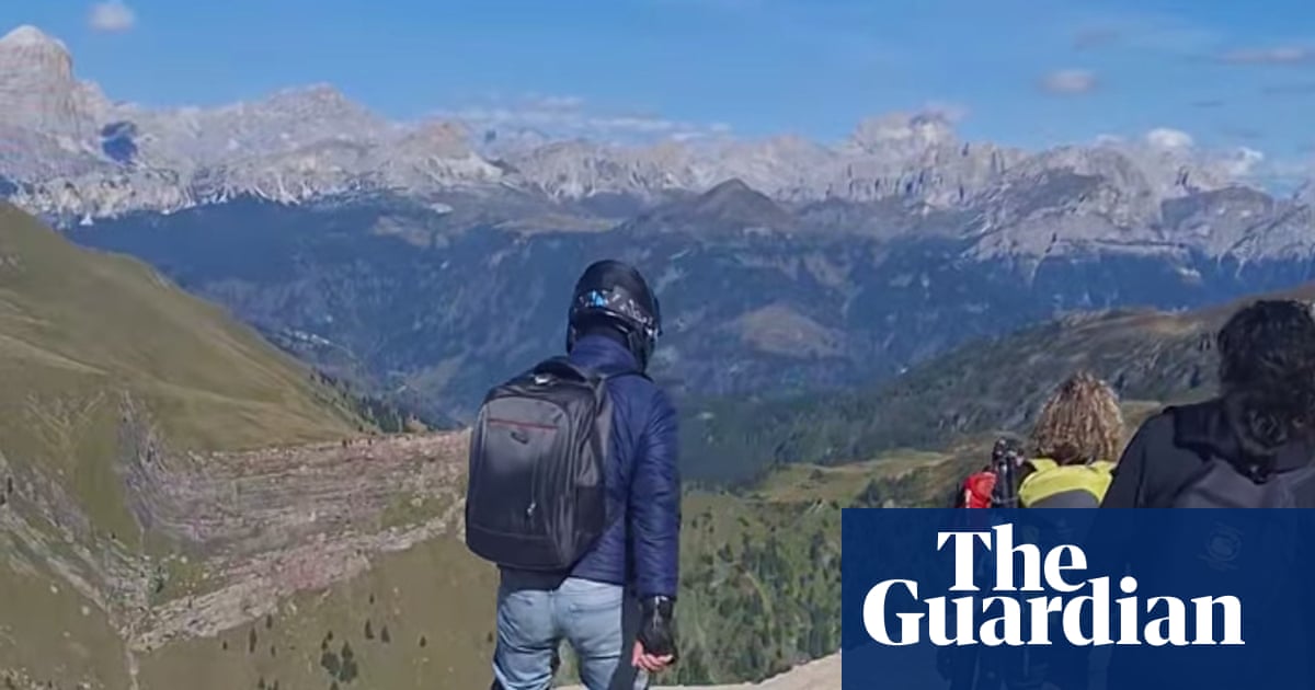 Tourist riding electric unicycle spotted on Dolomites hiking trail | Italy