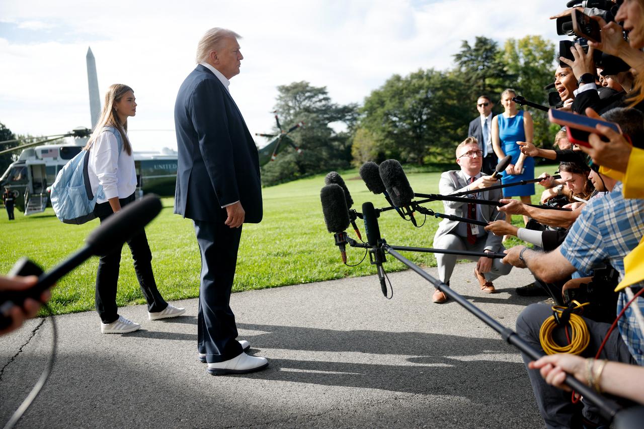 U.S. President Donald Trump speaks to members of the media as he departs the White House in Washington, U.S. on Sept. 26, 2025. (AFP Photo)