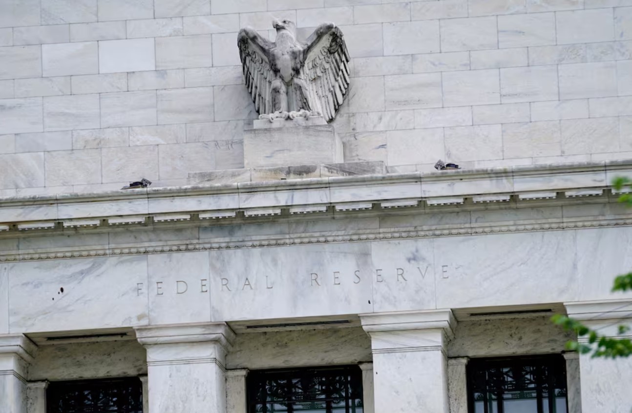 cover Fed expected to cut interest rates while ending bond drawdown