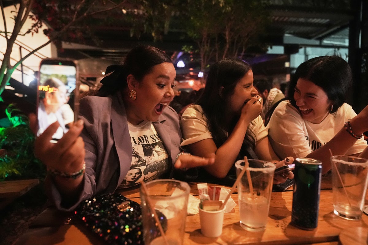 From tequila cocktails to themed pop-ups, Taylor Swift fans celebrate 'The Life of a Showgirl'