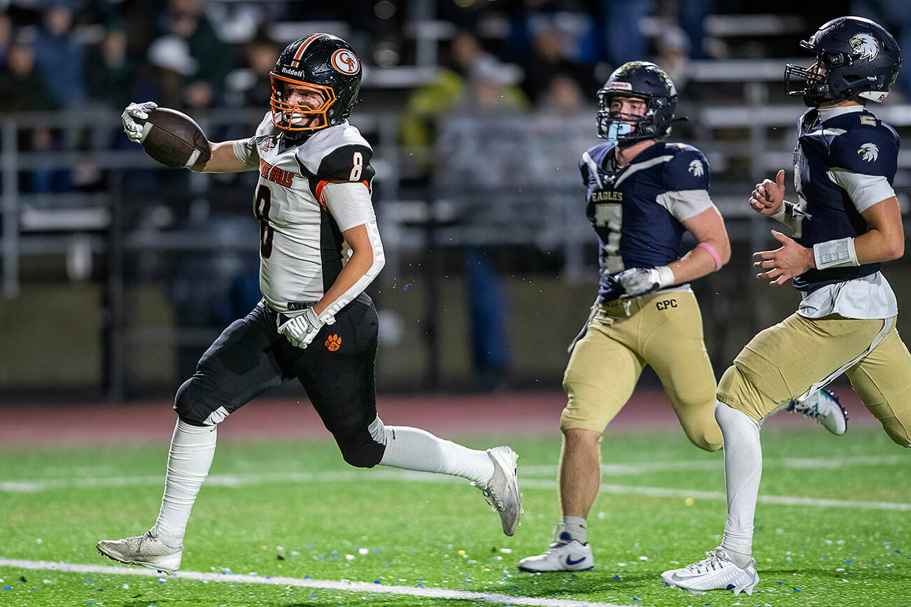 Granite Falls’ Drake Smith runs the ball into the end zone for a touchdown during the game against Cedar Park Christian on Oct. 24, 2025 in Kirkland, Washington. (Olivia Vanni / The Herald)