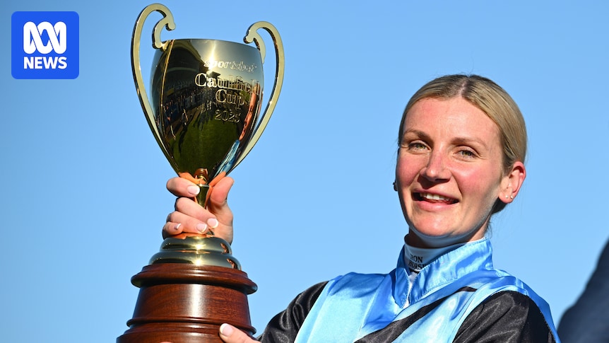 Jamie Melham creates Caulfield Cup history after riding Half Yours to victory
