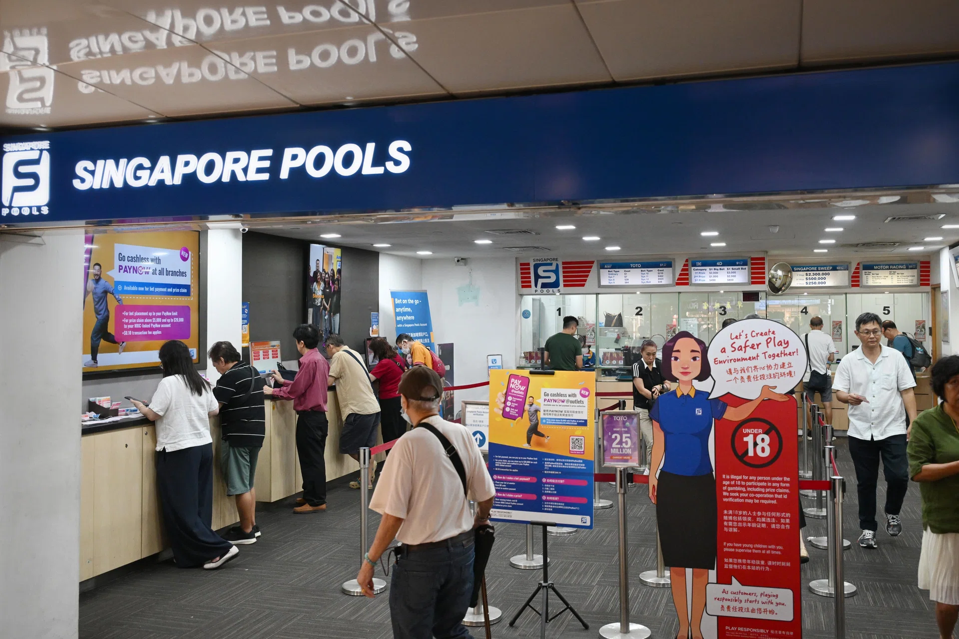 Singapore Pools’ 10-cent PayNow fee under scrutiny; surcharges by merchants prohibited, says DPM Gan