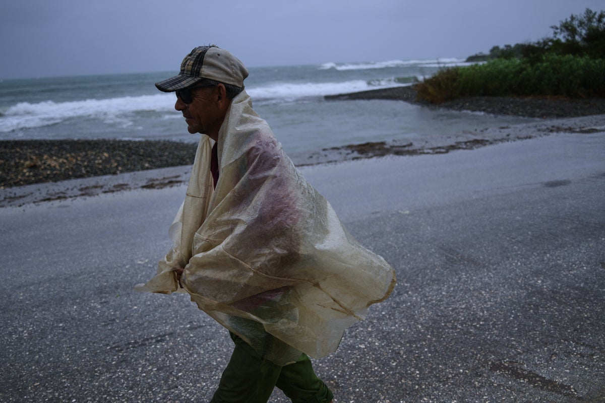 The Latest: Hundreds of thousands evacuate as Hurricane Melissa hits eastern Cuba