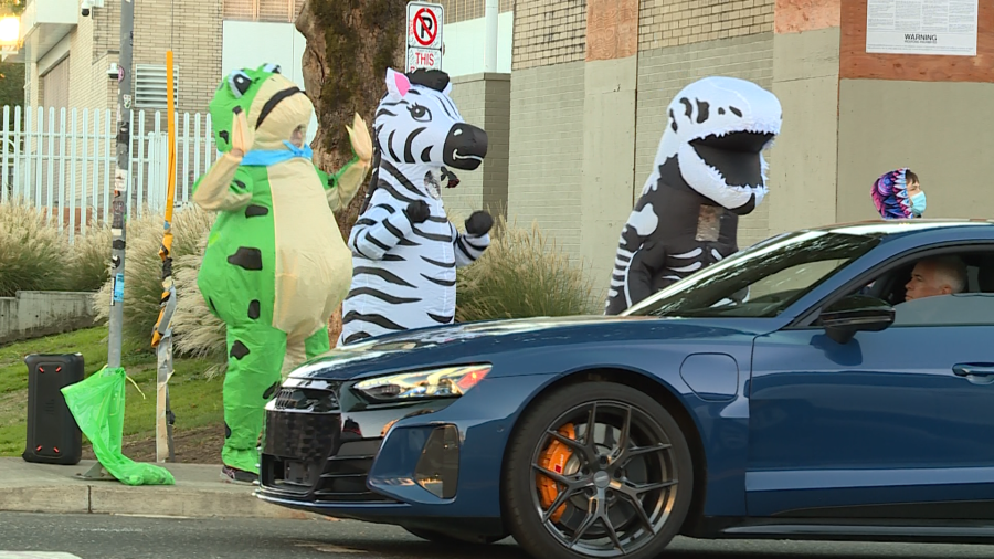 Tourists join costumed protesters at Portland ICE facility