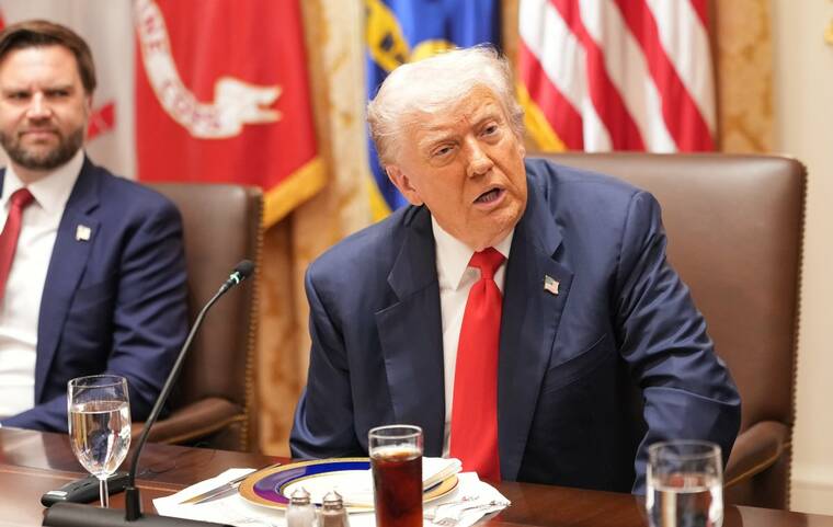 Trump signs memo expanding his authority to spend federal money