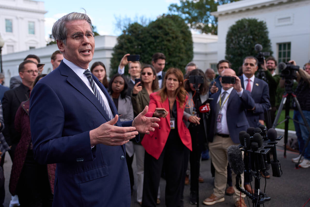 Treasury Secretary Scott Bessent speaks with reporters at the White House, Wednesday, Oct. 22, ...