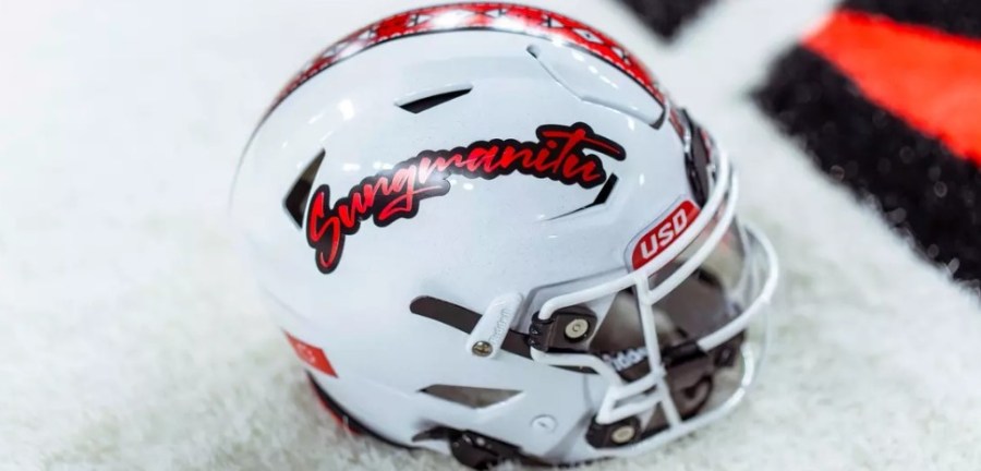 USD football unveils new helmet for Native Heritage game
