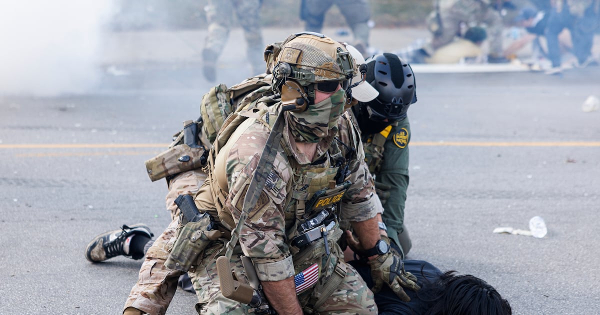 Using helicopters and chemical agents, immigration agents become increasingly aggressive in Chicago