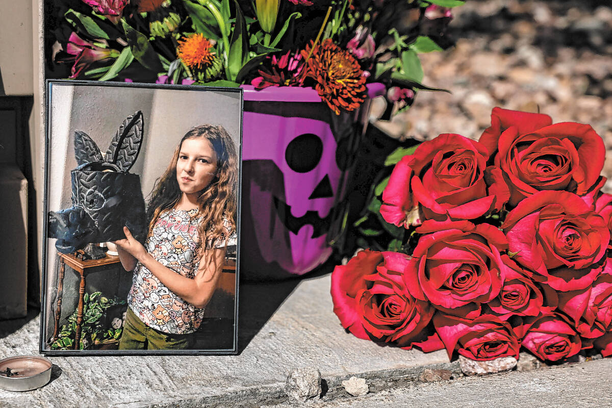 A memorial to Haylee Ryan, 12, who was hit by a bus while riding a bicycle near West Tropical P ...