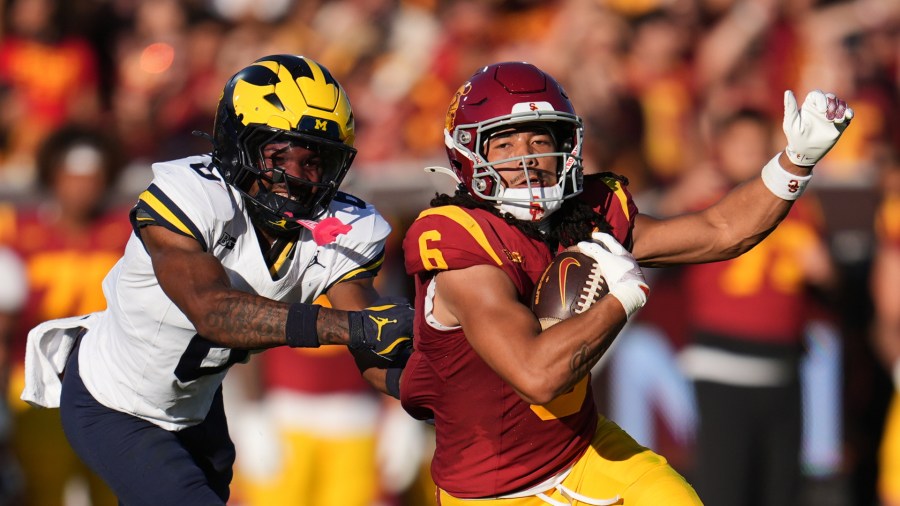 Walk-on RB King Miller powers hard-nosed USC to a 31-13 victory over No. 15 Michigan