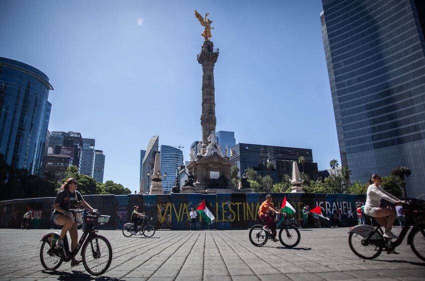 Cyclists enjoy a car-free Paseo Dominical along Reforma Avenue in Mexico City.