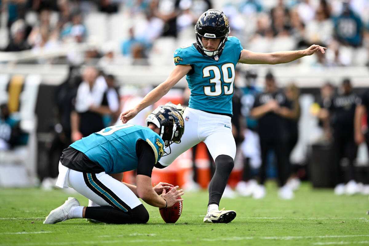 Jacksonville Jaguars kicker Cam Little (39) kicks a field goal against the Houston Texans durin ...