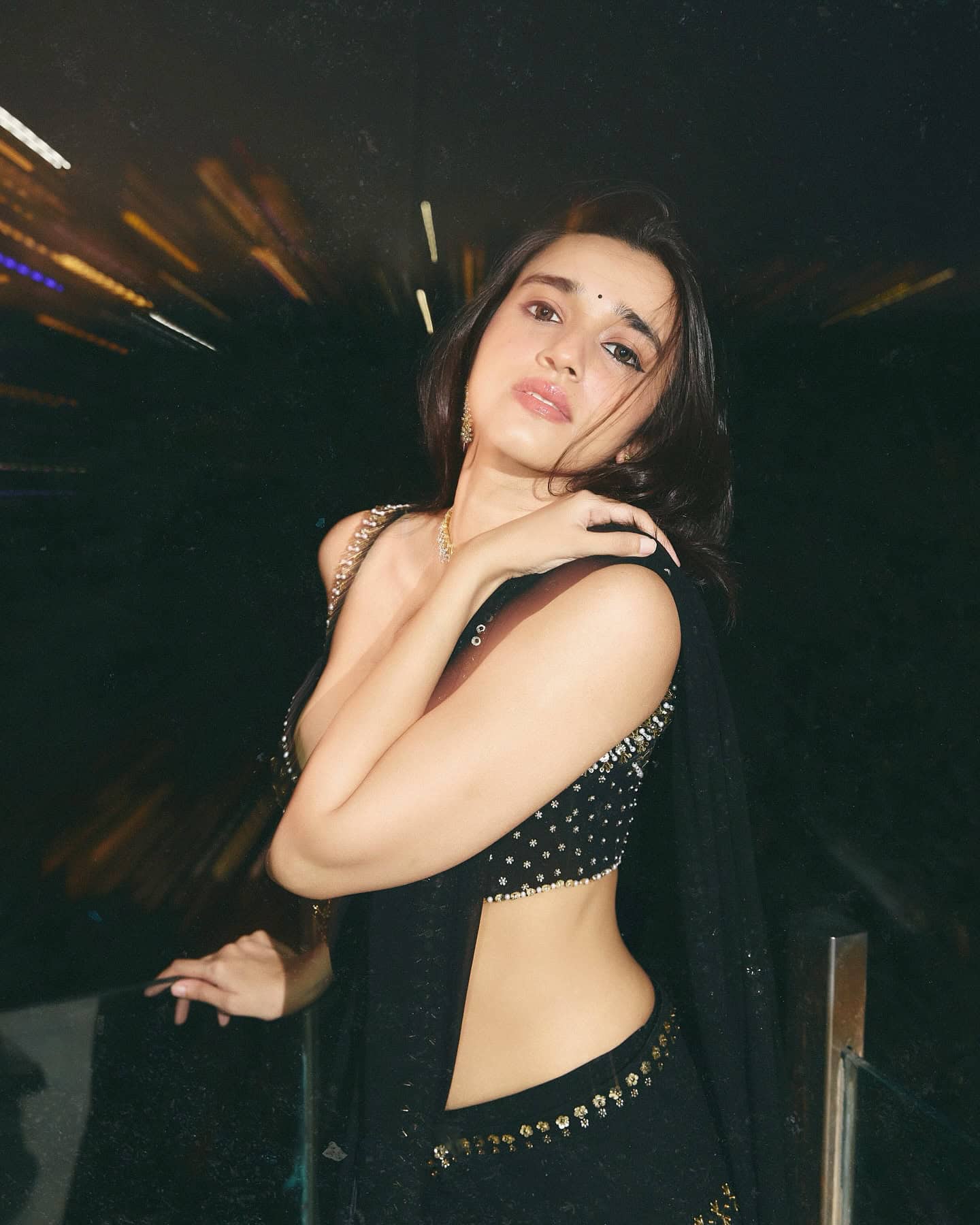 Nuveksha Spices Up The Internet In Black Saree