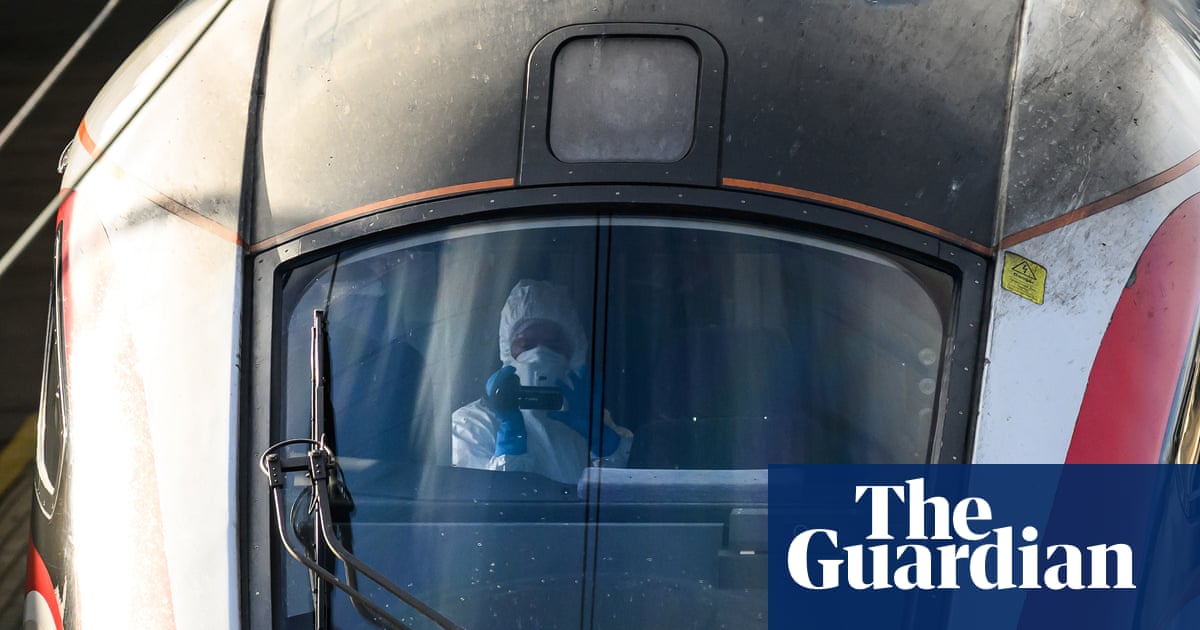 Two men in police custody after mass stabbing on Cambridgeshire train | UK news