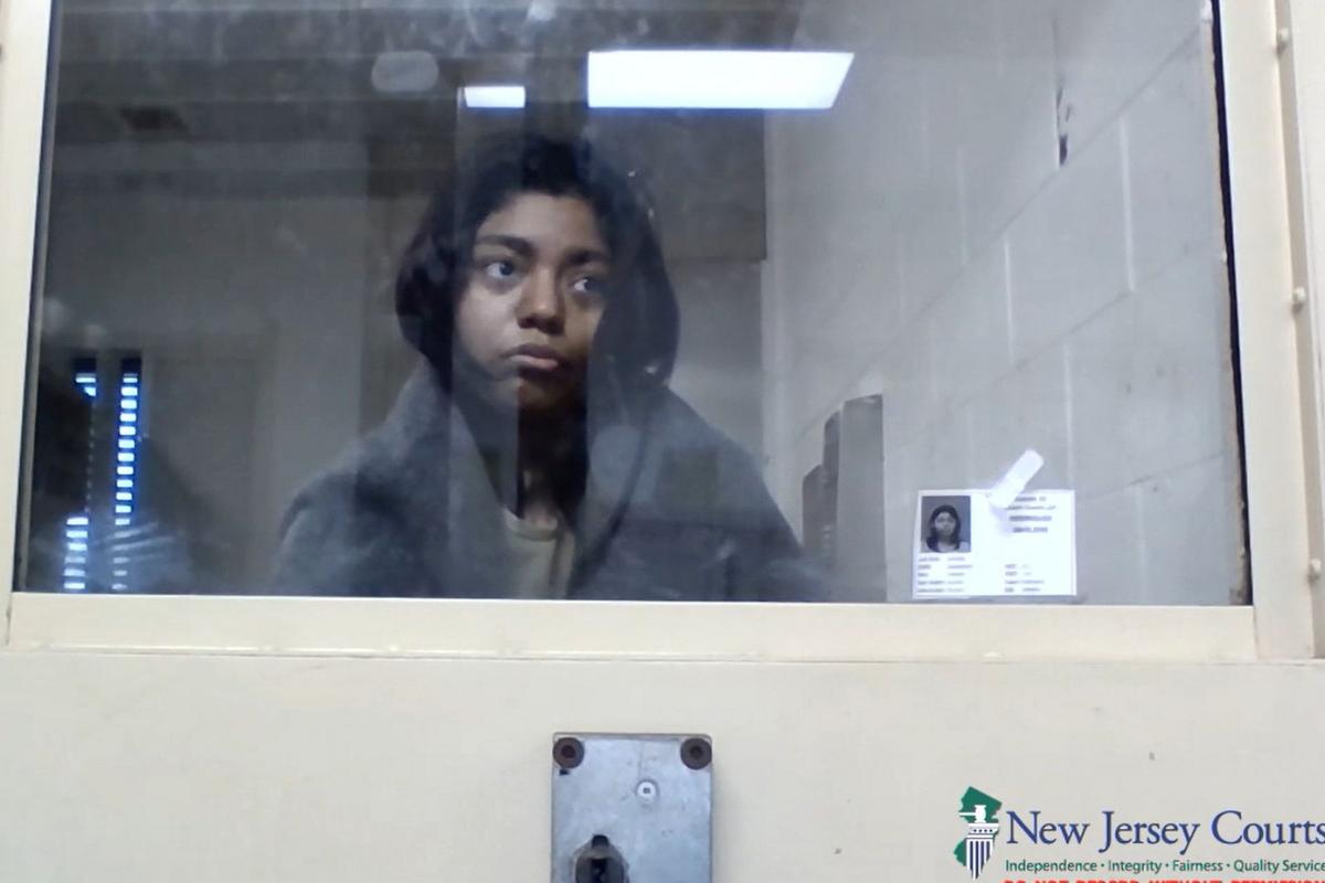 Woman charged with stabbing toddler brother heard voices