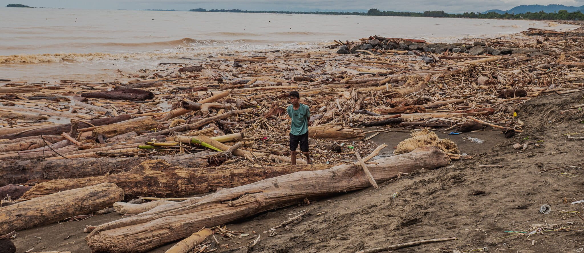 A flood of logs post-Cyclone Senyar leaves Padang fishers out of work