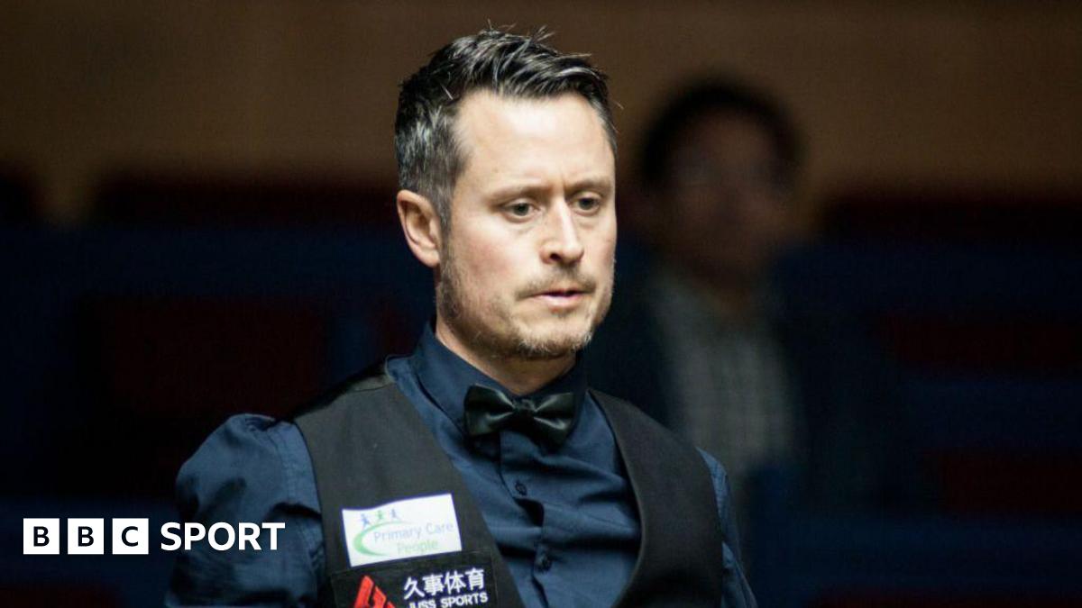 Alfie Burden wearing a waistcoat and shirt