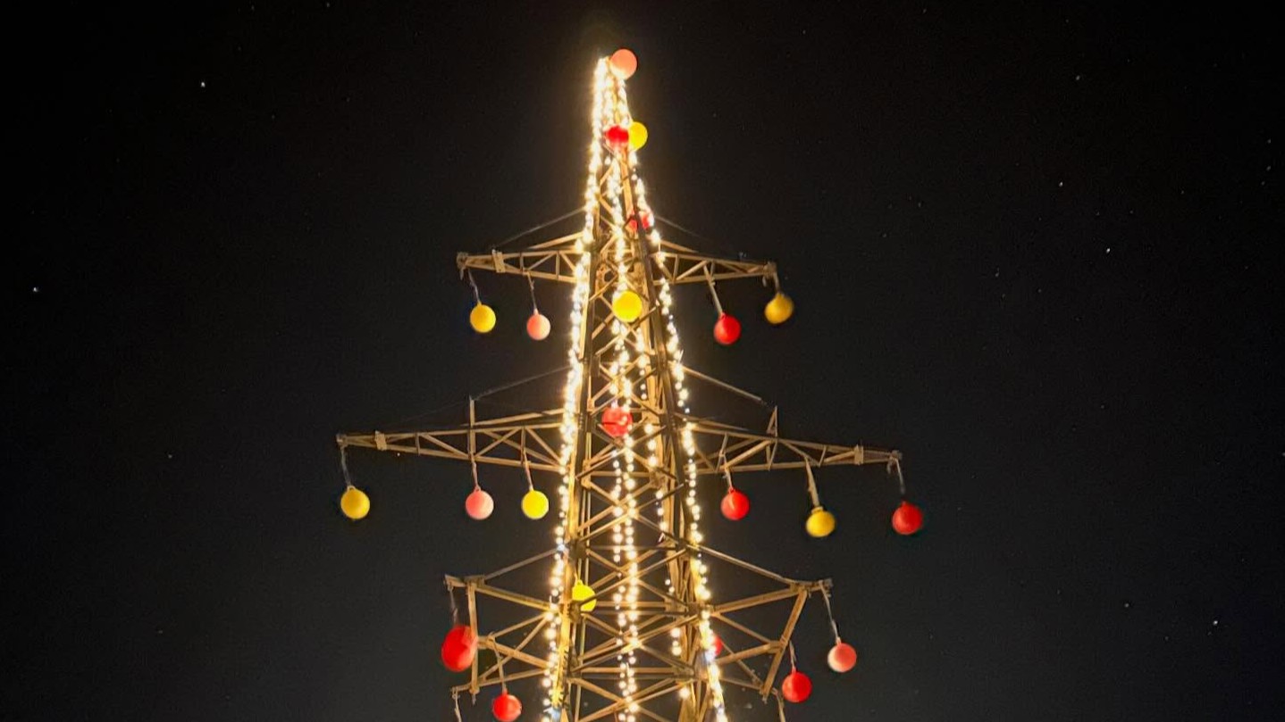 In Estonia, a disused power pylon on Saaremaa lights up as a Christmas tree, marking an unlikely environmental victory. Photo by Heiki Hanso.