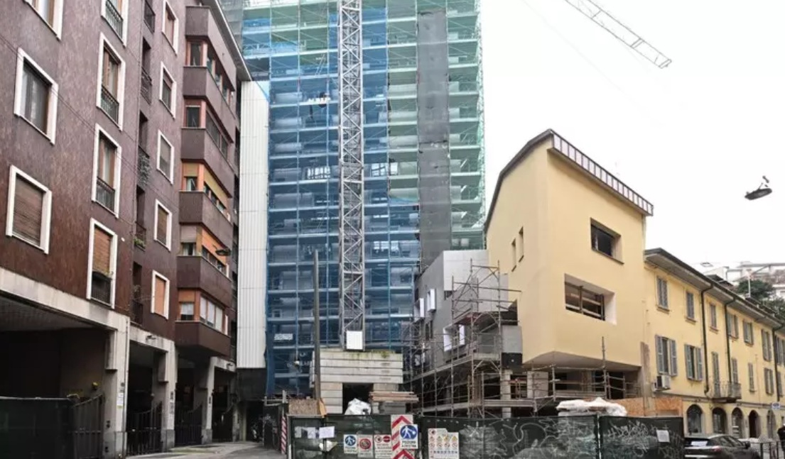 milan urban planning investigation - apartment block seized. Image shows apartment block under construction in Milan