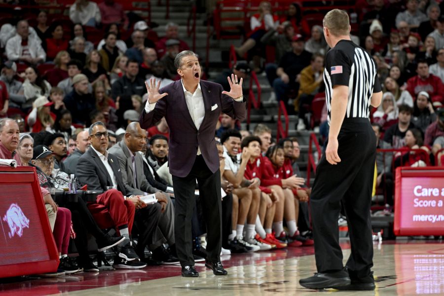 Arkansas coach John Calipari argues a call with the official during an NCAA college basketball game against James Madison Monday, Dec. 29, 2025, in Fayetteville, Ark. (AP Photo/Michael Woods)