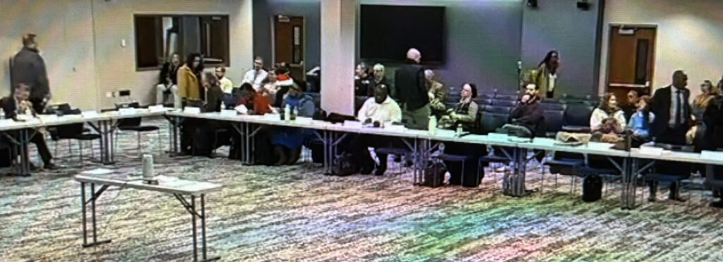 Redding Consortium Board members around U-shaped meeting table