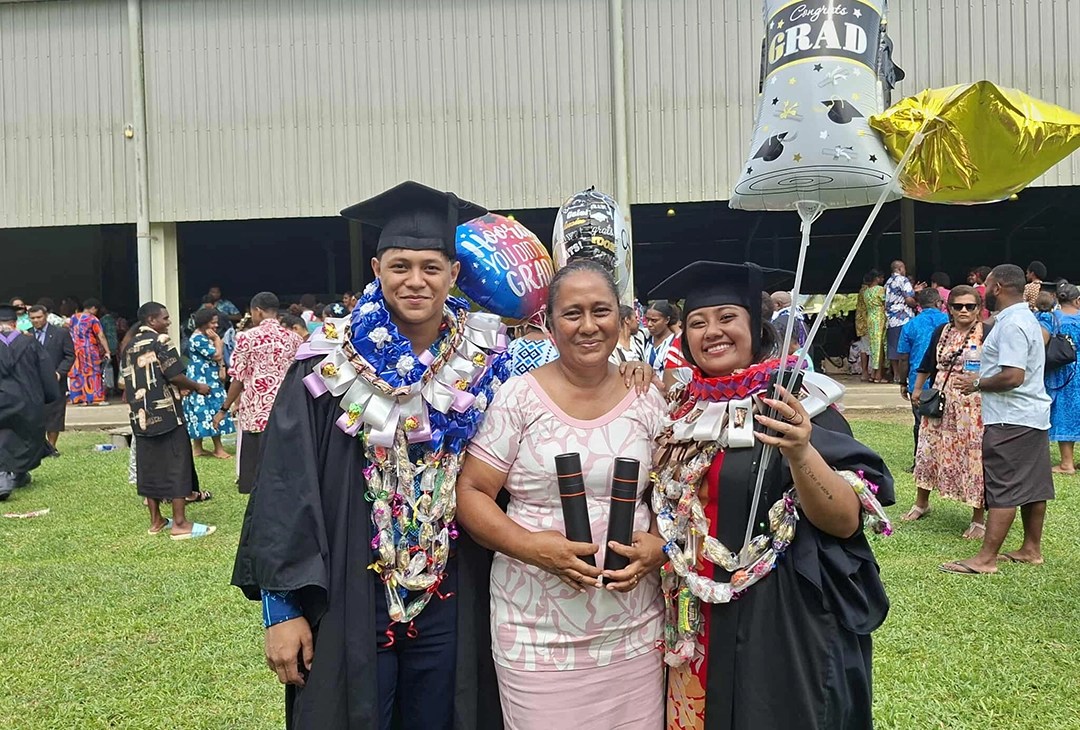 Siblings graduate together after years of study away from home